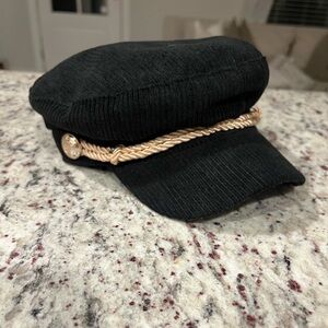 Chic Black Cap with Gold Accent